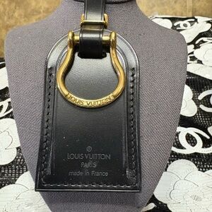 Authentic LV Black Tag with an Authentic Gold Hardware for a touch of class